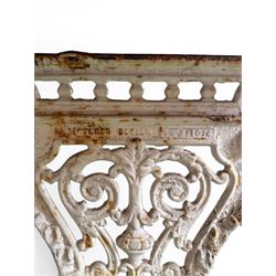 Victorian cast iron garden table, rectangular slate top raised on pierced scrolling foliate end supports with urn and column designs, united by a spindle support stretcher with scrolling acanthus spandrels, stamped 'Registered Design' with indistinct number, in distressed white painted finish
