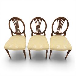 Bevan Funnell Reprodux - Regency design set of ten mahogany dining chairs, oval backs with central splat with rose motif, serpentine seat upholstered in damask fabric, raised on turned supports