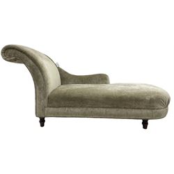Contemporary chaise longue with scrolled back, upholstered in champagne crushed velvet, on turned feet