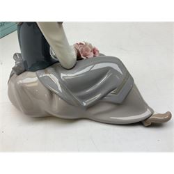 Three Lladro figures, comprising Pondering, no 5173, Nostalgia, no 5071 and Nature's Bounty, no 1417, all with original boxes, largest example H27cm