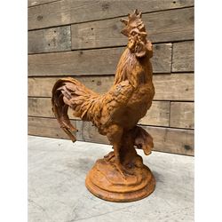 Small weathered cast iron garden cockerel