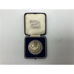 Charles I 1625 hammered silver sixpence, Queen Victoria 1894 crown coin and a cased hallmarked silver medal for the Hull photographic society, engraved '1940' 'Leonard Vokes', all housed in a red Pobjoy Mint coin box