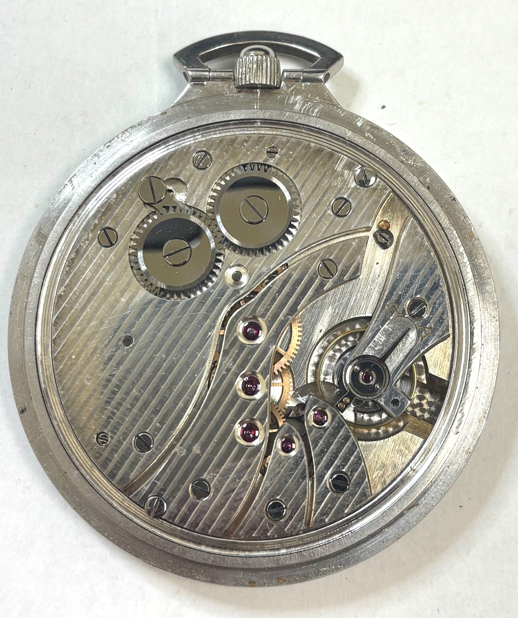 Art Deco platinum open face keyless level slim pocket watch, silvered dial with Arabic hour markers and subsidiary seconds dial, case signed H & S All Platinum 