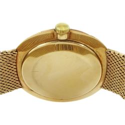 Movado gentleman's 9ct gold manual wind wristwatch, silvered dial with baton hour markers and subsidiary seconds dial, London 1958, on integral 9ct gold bracelet