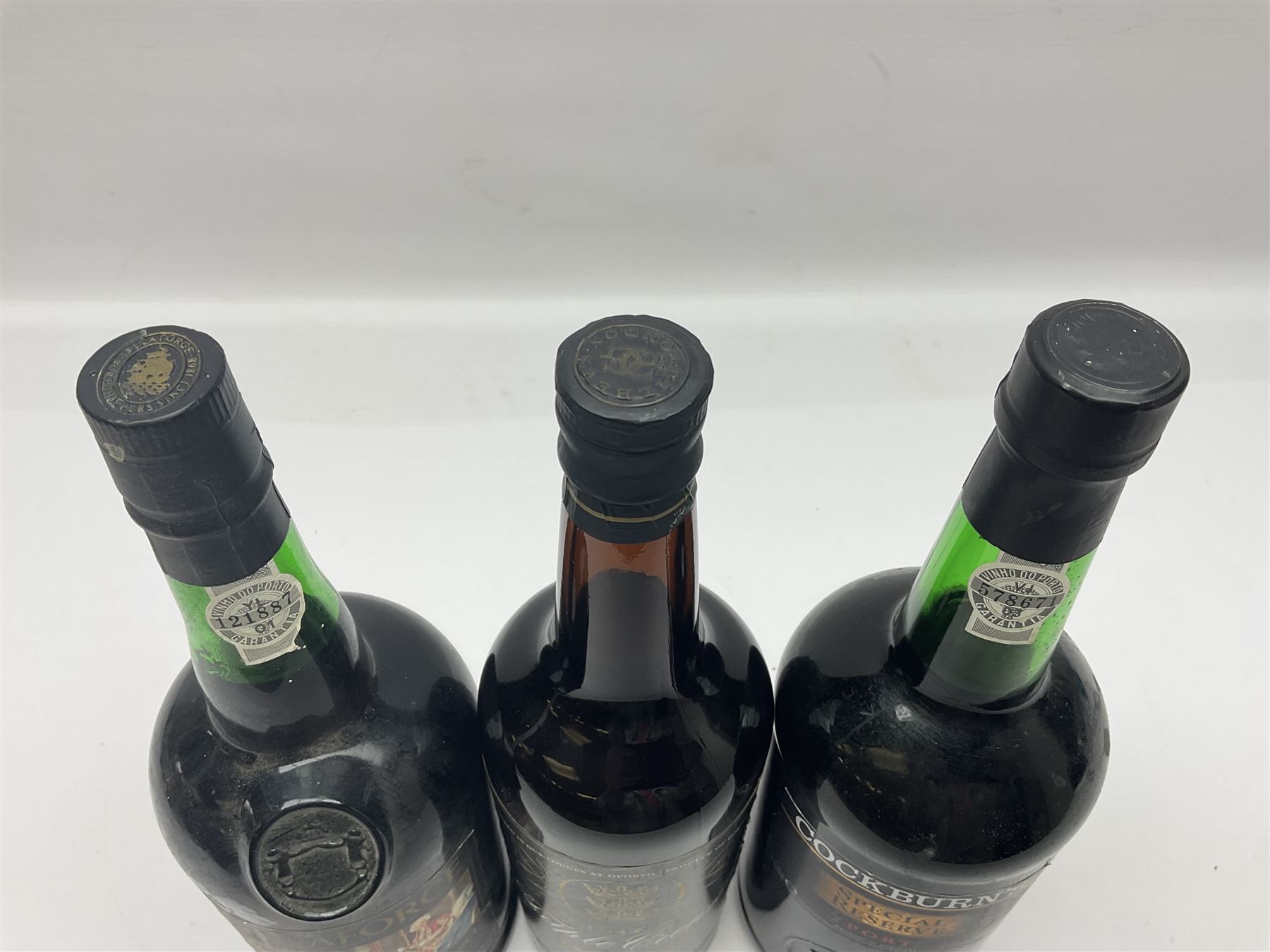 Delaforce, 10 year old, tawny port, Cockburn's special reserve port and Gilbey Triple Crown port, various contents and port (3)