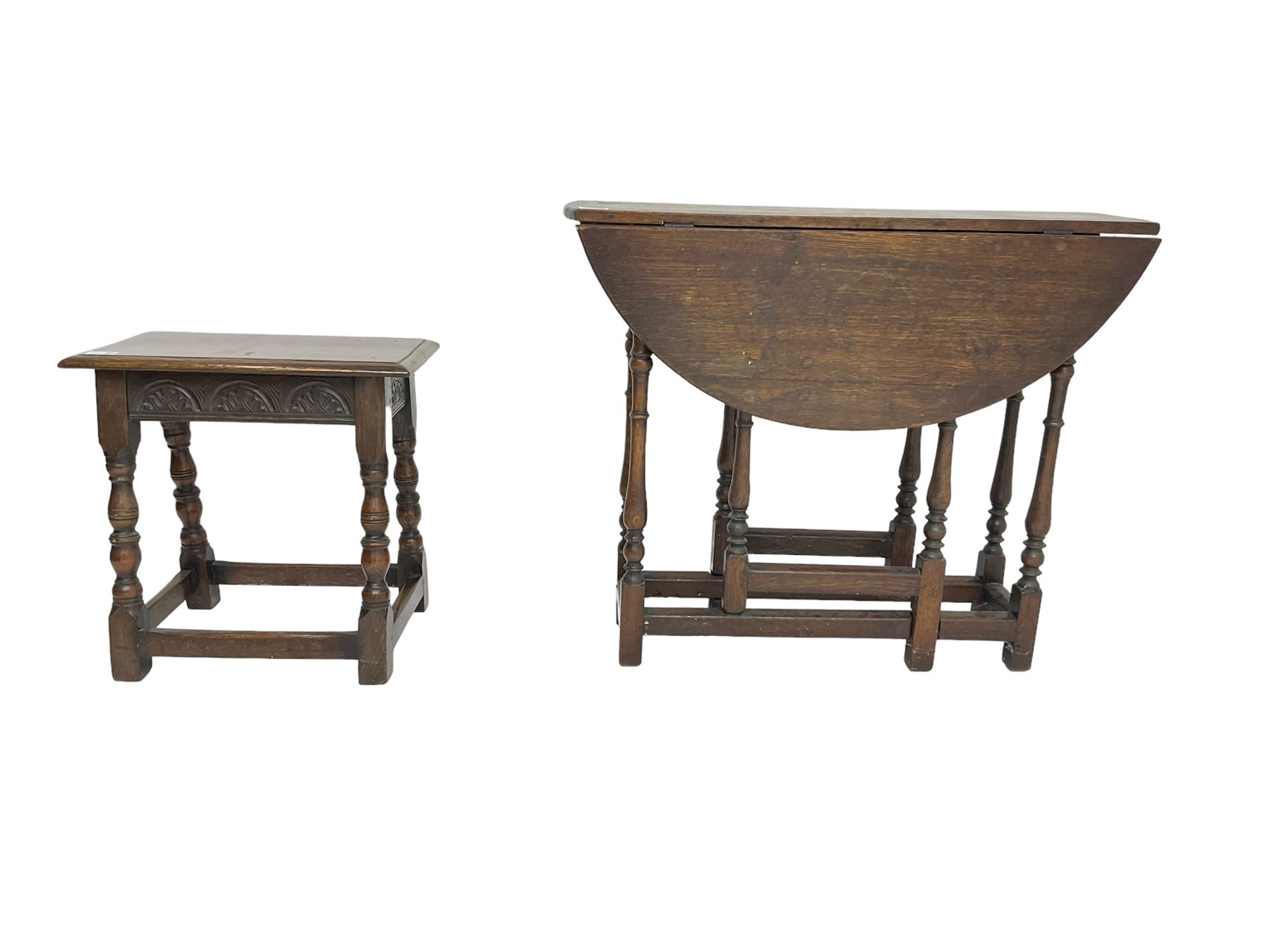 17th century design oak coffin or joint stool, rectangular top over lunette carved frieze rail, raised on turned supports (W46cm D26cn H45cm); and 19th century small oak drop-leaf gateleg table, circular top raised on turned supports (W80cm H67cm)