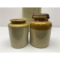 Large 2 gallon stoneware flagon, stamped 'John Soulby Wine Merchant Malton 2 Gall', together with a collection of similar stoneware jars and bottles, largest H40.5cm