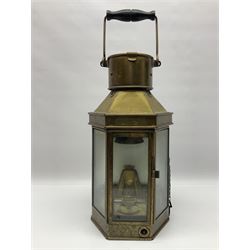 Large brass maritime lamp by Griffiths & Sons Birmingham with swing handle, threaded mounting bracket and associated oil burner, H41cm excluding handle