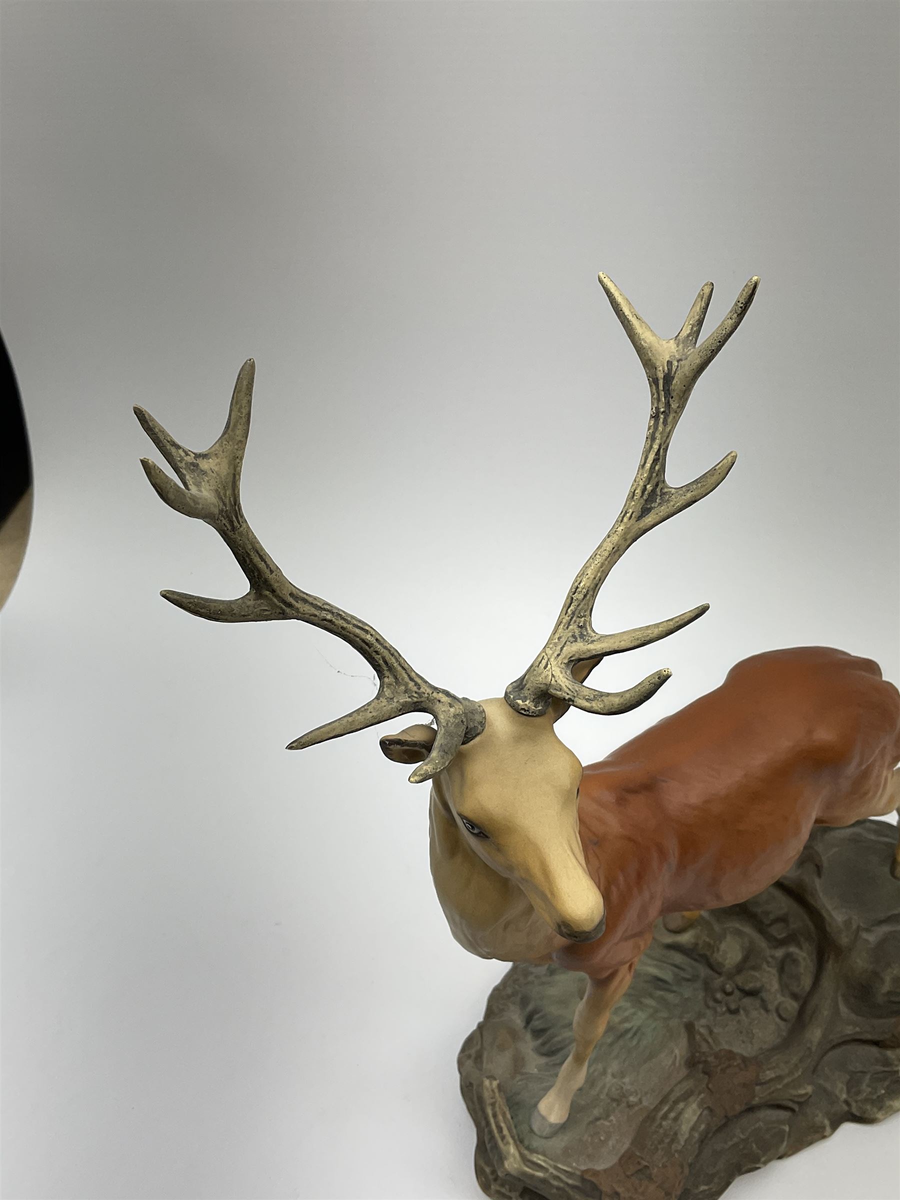 A Beswick Connoisseur matt model of a Stag upon a rocky modelled base, 2629