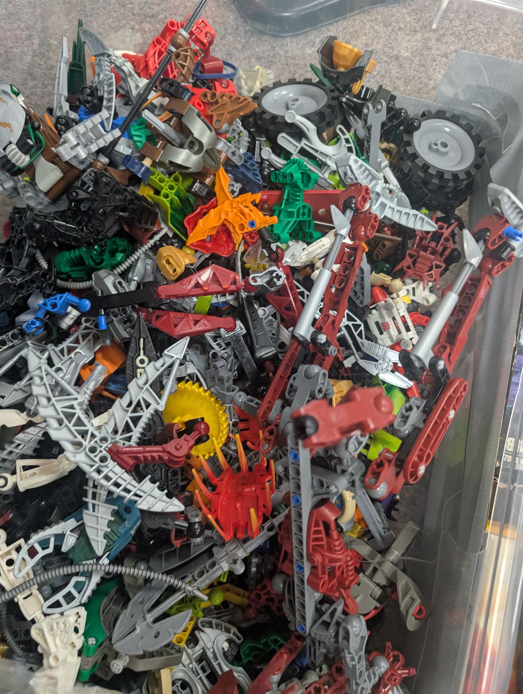 Lego Bionicle and similar part built figures and parts, including boxed sets and loose, together with a Lego Ninjago Build Your Own Adventure set and ten LEDlite Legends of Chima keyrings
