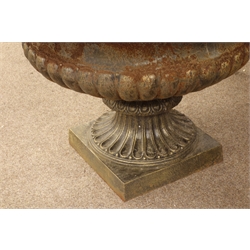  Large cast iron urn, rim moulded with scrolling lunettes, H90cm, W130cm  