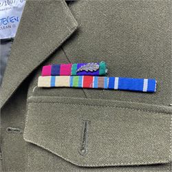 Two post-WWII British Army No.2 Dress tunics, one with Green Howards buttons; army shirt dated 1951; Royal Fleet Auxilliary jacket with trousers; three RAF/WAAF uniforms and RAF Greatcoat; and three canvas/webbing bags, two dated 1943 & 1945