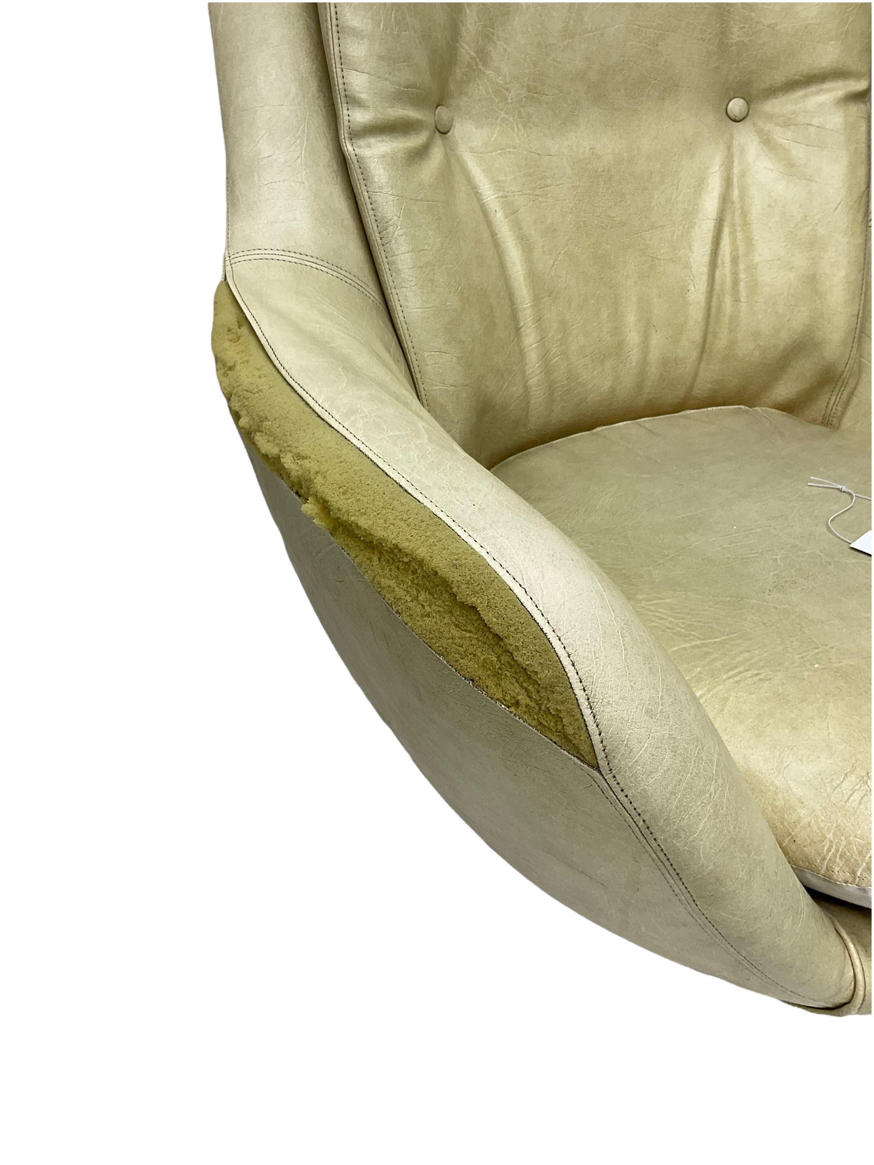 Parker Knoll - pair of swivel statesman chairs, circa. 1960s