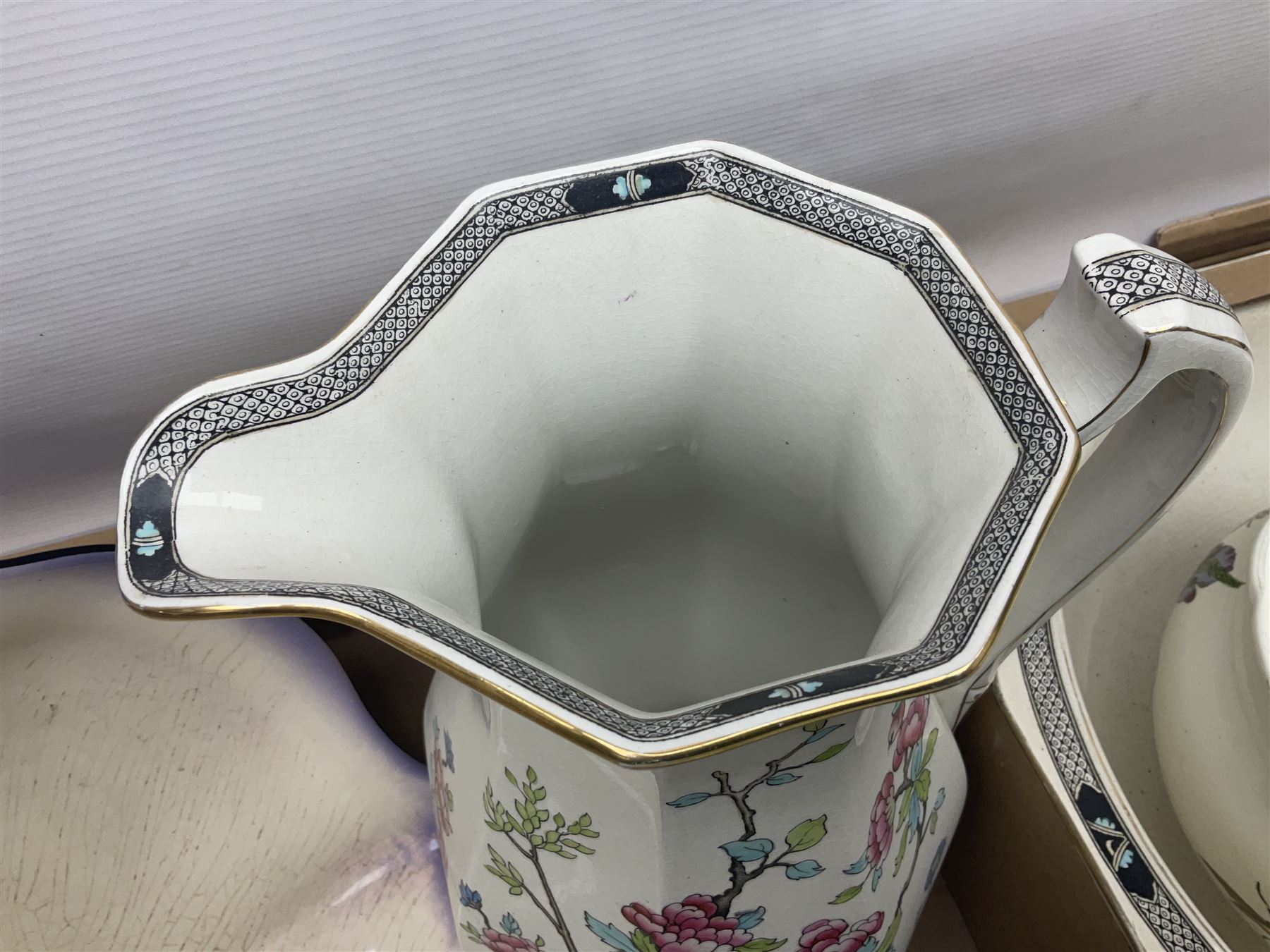 Royal Winton Art Deco style wash jug and bowl, in geometric purple design, together with two other large wash jugs with bowls and other similar ceramics, in three boxes 