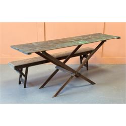 Early 20th century pine trestle table, the hinged top on a folding 'X' frame base. (H79cm,...