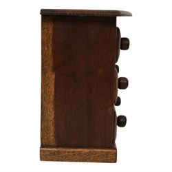 Table top chest of draws, fitted with three draws, upon a skirt base, together with another table top chest 