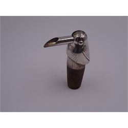 Modern silver novelty bottle pourer, modelled as a stylised bird, the articulated spout its' beak, fitted upon a cork, hallmarked Royal Irish Silver Co, London import 1973, also stamped Sterling, when beak facing forward H7.5cm