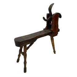Early 19th century cobbler's work bench, in various woods, revolving cast iron last on yew wood supports, pine seat with inset maker's plaque inscribed 'No 7 Josh Blacker Harehills Leeds', on turned elm front supports and turned beech rear supports 