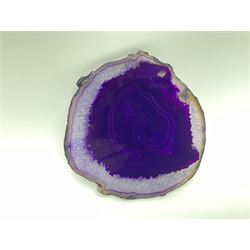 Pair of purple agate slices, polished with rough edges, raised upon gilt metal stands