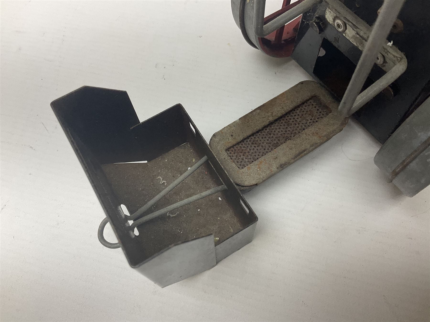 Mamod TE1a steam traction engine with burner, bunker, steering rod and funnel; red and black painted Tri-ang tin-plate Jones KL44 mobile crane; and two Hull Savings Bank Home Safe money boxes; all unboxed (4)