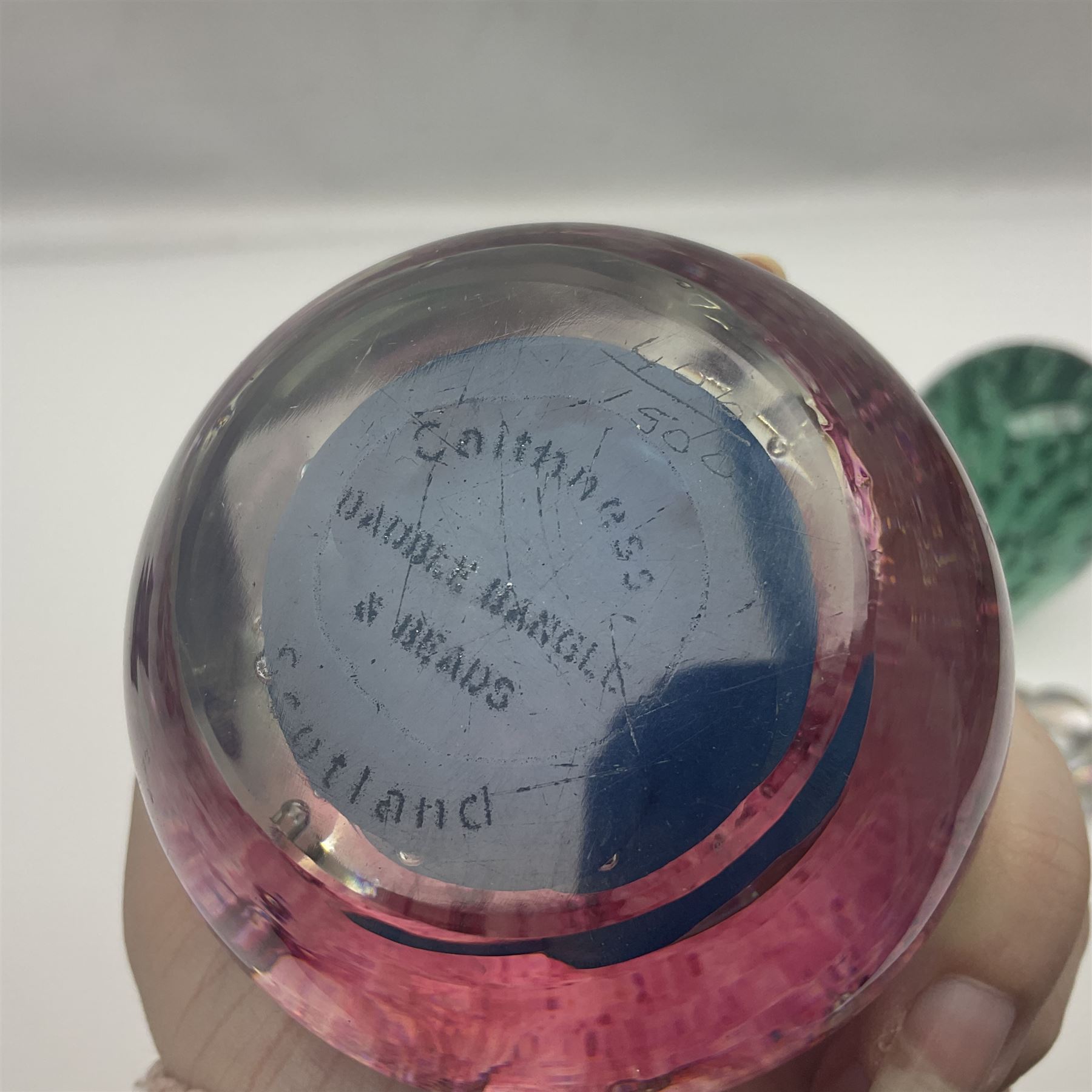 Pair of Victorian green glass dump paperweights with air bubble inclusions, together with Caithness paperweight and three other paperweights, dump H15cm