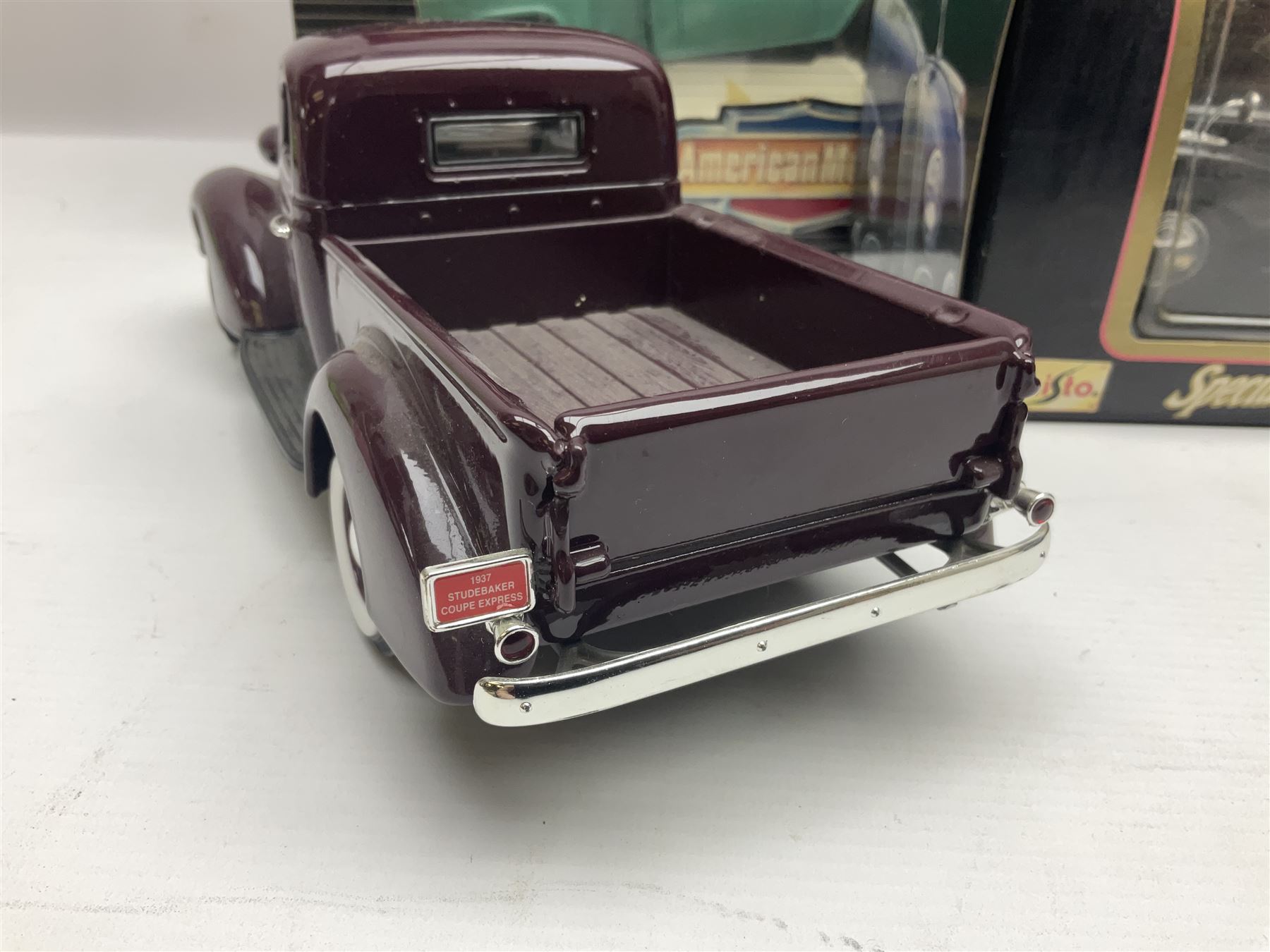 Seven 1:18 scale die-cast models by Ertl, Road legends, Maisto, Solido etc including two Coca Cola promotional vehicles; five boxed (7)