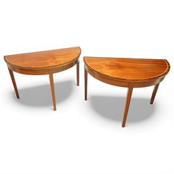 Pair of 20th century demi-lune side tables, decorated with satinwood stringing and contras...