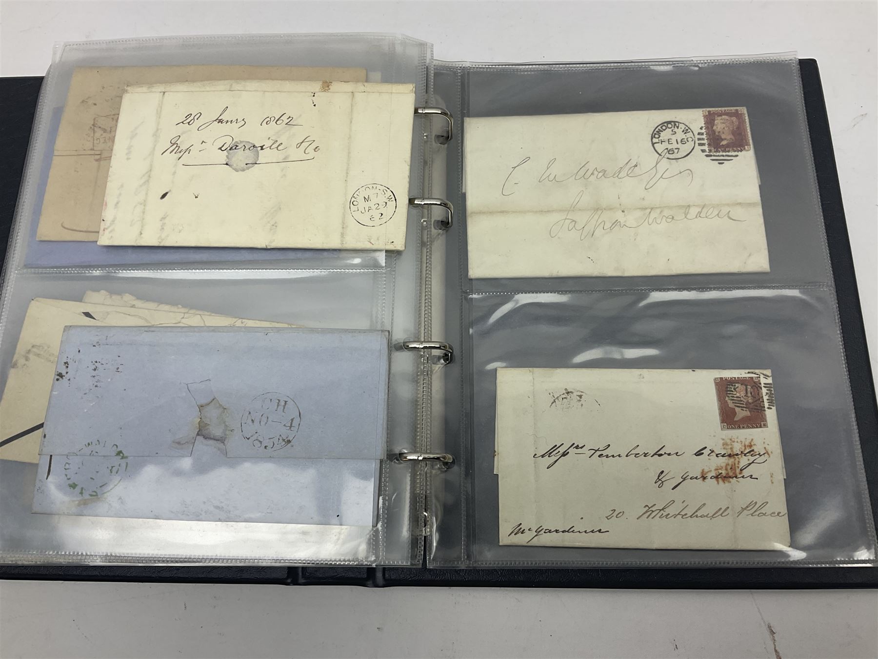 Postal history, including imperf penny reds on covers or entires, mourning cover, Cape of Good Hope overprinted postal stationary, pre-stamp items etc, housed in a ring binder folder
