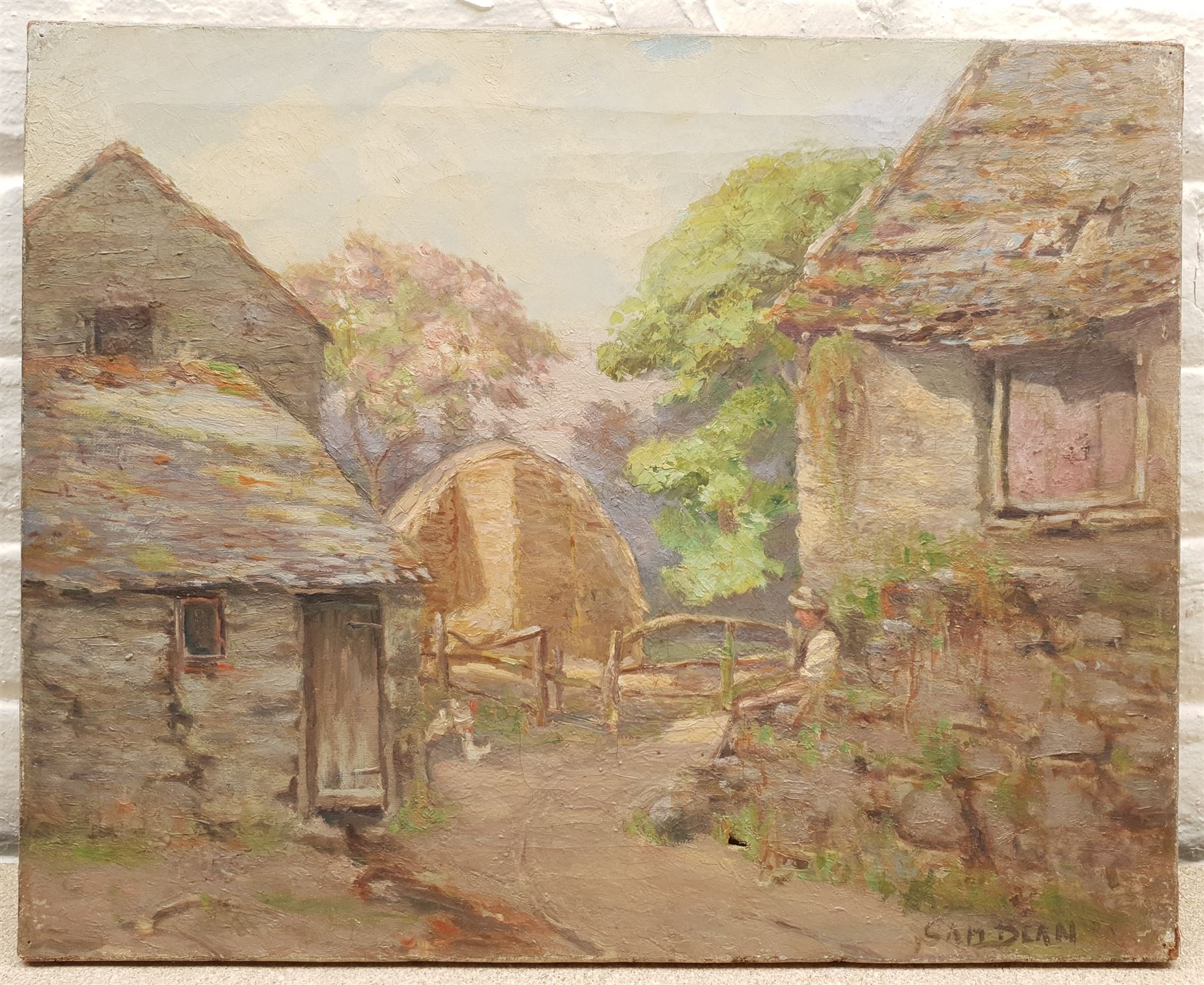 Samuel Dean (British exh.1895-1938): Farmer Resting before a Hayrick, oil on canvas signed 41cm x 51cm (unframed)