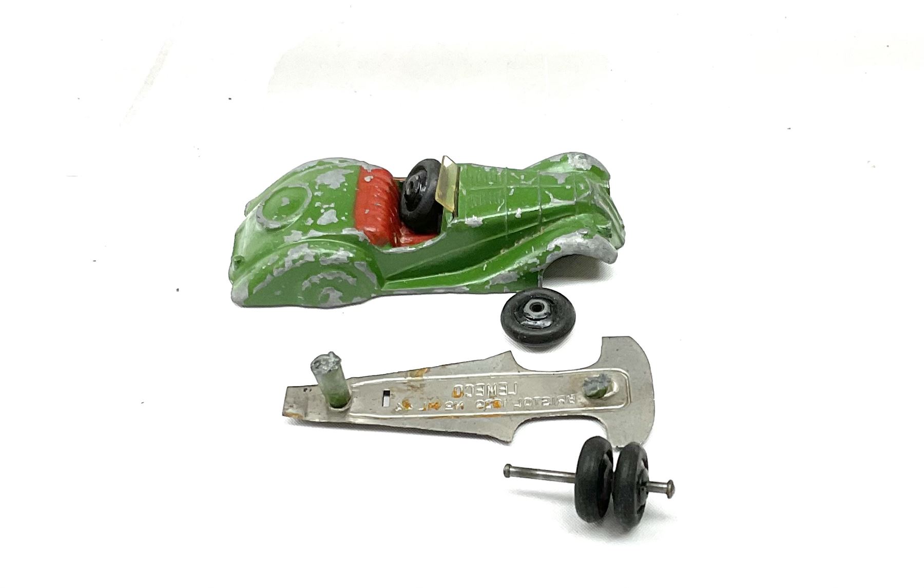 Various Makers - fourteen unboxed and playworn early die-cast models comprising seven by Kemlow/Automec including Pickfords Removal van, two grit spreaders and open back lorry; Buccaneer Bentley open top tourer; Betal friction-drive car and another; two Kembo cars; Lemeco Ford 1950 Sedan; and incomplete Lemeco Bristol 1939 tourer for assembly (14)