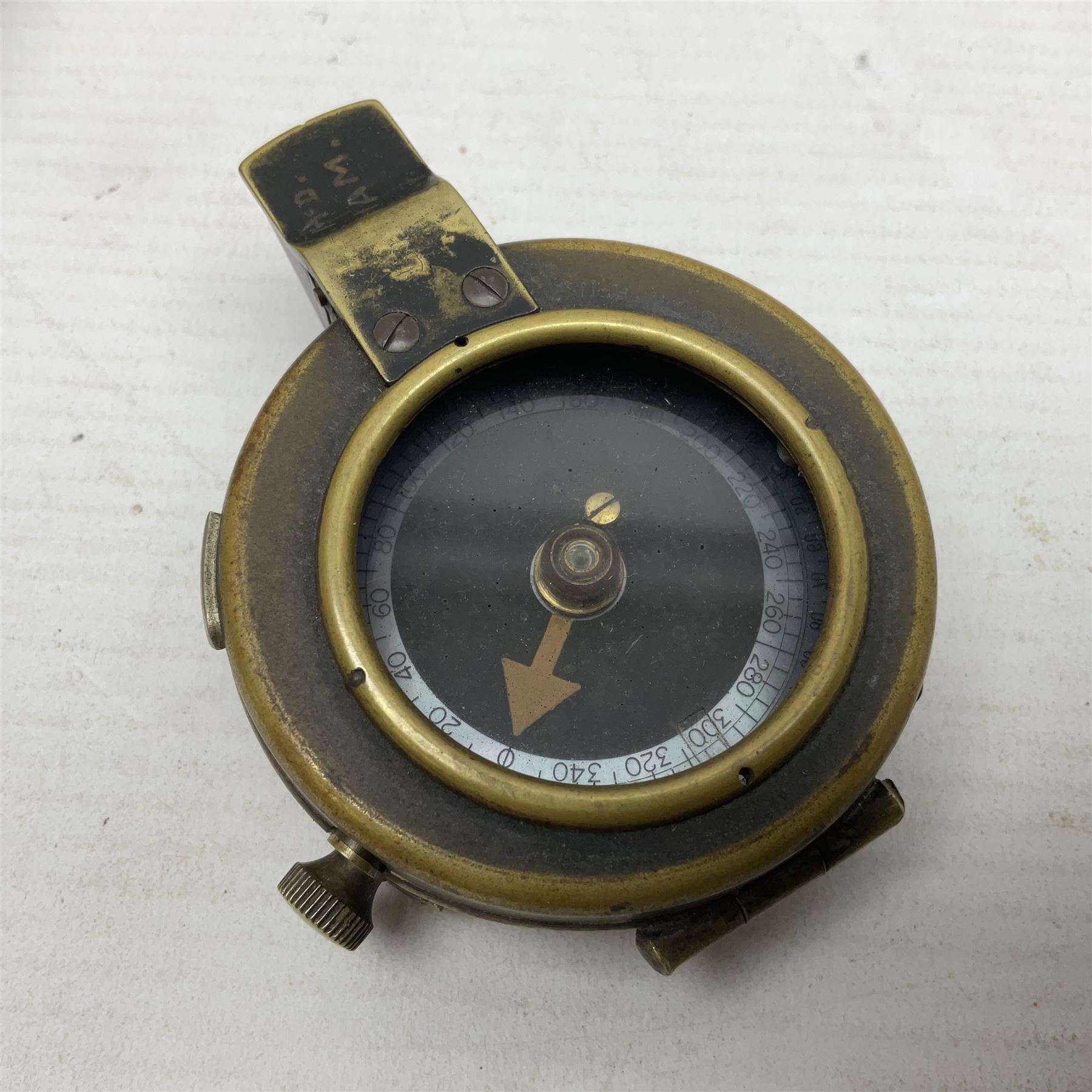 Broadhurst Clarkson brass and leather 4-draw telescope, the first draw with graduations, sliding lens shroud and leather covers for both ends on shoulder strap; marked 'Broadhurst Clarkson & Co. Ltd. 63 Farringdon Road London E.C.', L87cm fully extended; together with a WWI brass marching compass marked F-L No.123113 1918 (broad arrow); crudely etched L.H. McD. Latham; in associated Brooks & Co. leather case dated 1913 stamped W.B. Constable (2)