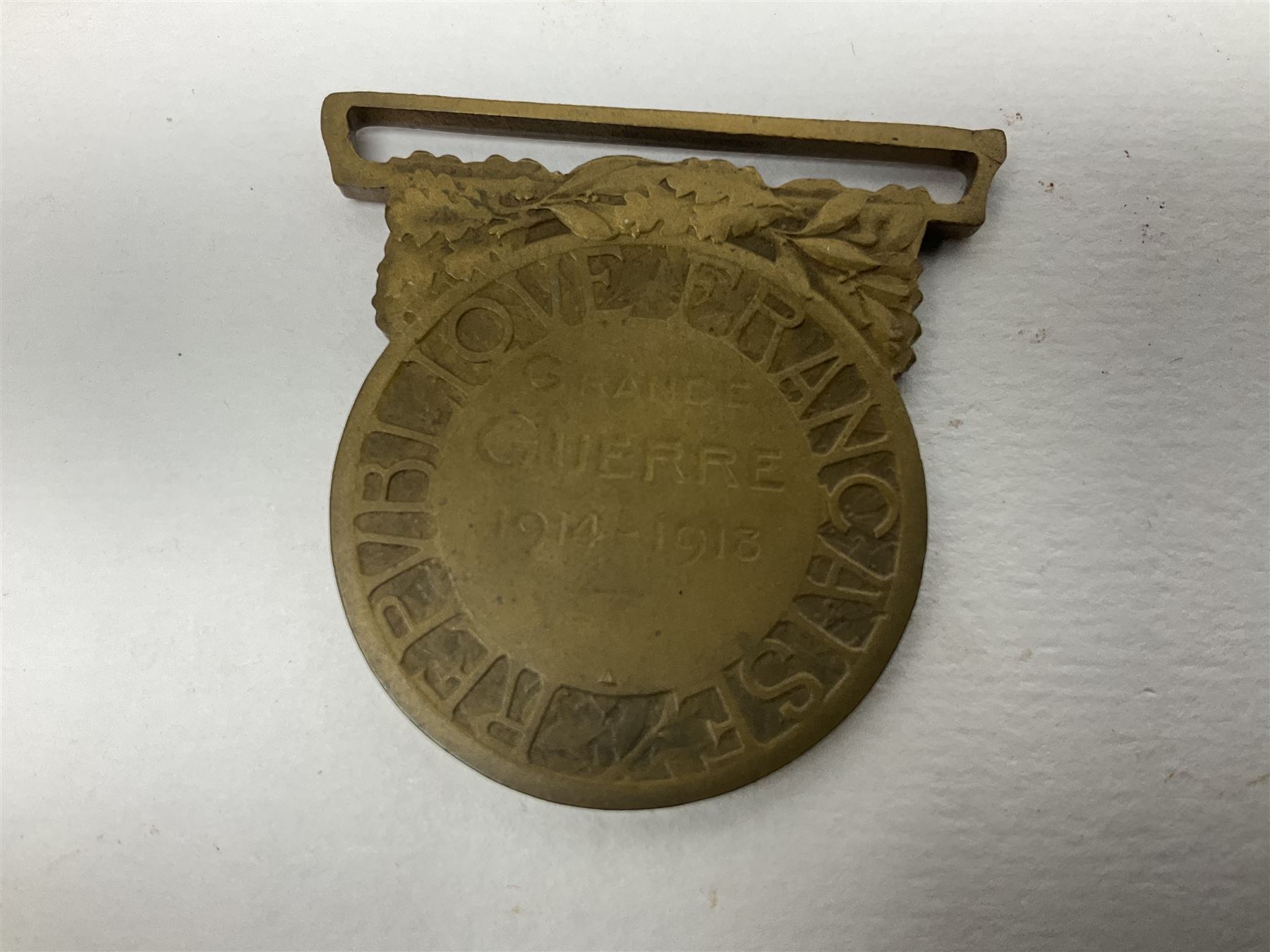 Five WW1 French medals comprising Medaille Militaire Gallantry Award, two Croix de Combattant, Medaille Commemorative Francais 1914-18 and a Patriotic Medal; together with small quantity of Russian badges etc