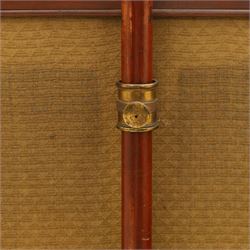 Two Victorian fire screens, comprising mahogany pole screen with glazed floral woolwork panel on turned support and triform base (H 142cm, W 48cm); and a larger carved walnut tapestry fire screen, glazed panel depicting a domestic interior scene, scroll carved cresting, barley twist uprights and turned stretcher base (H 75cm, W 49cm)