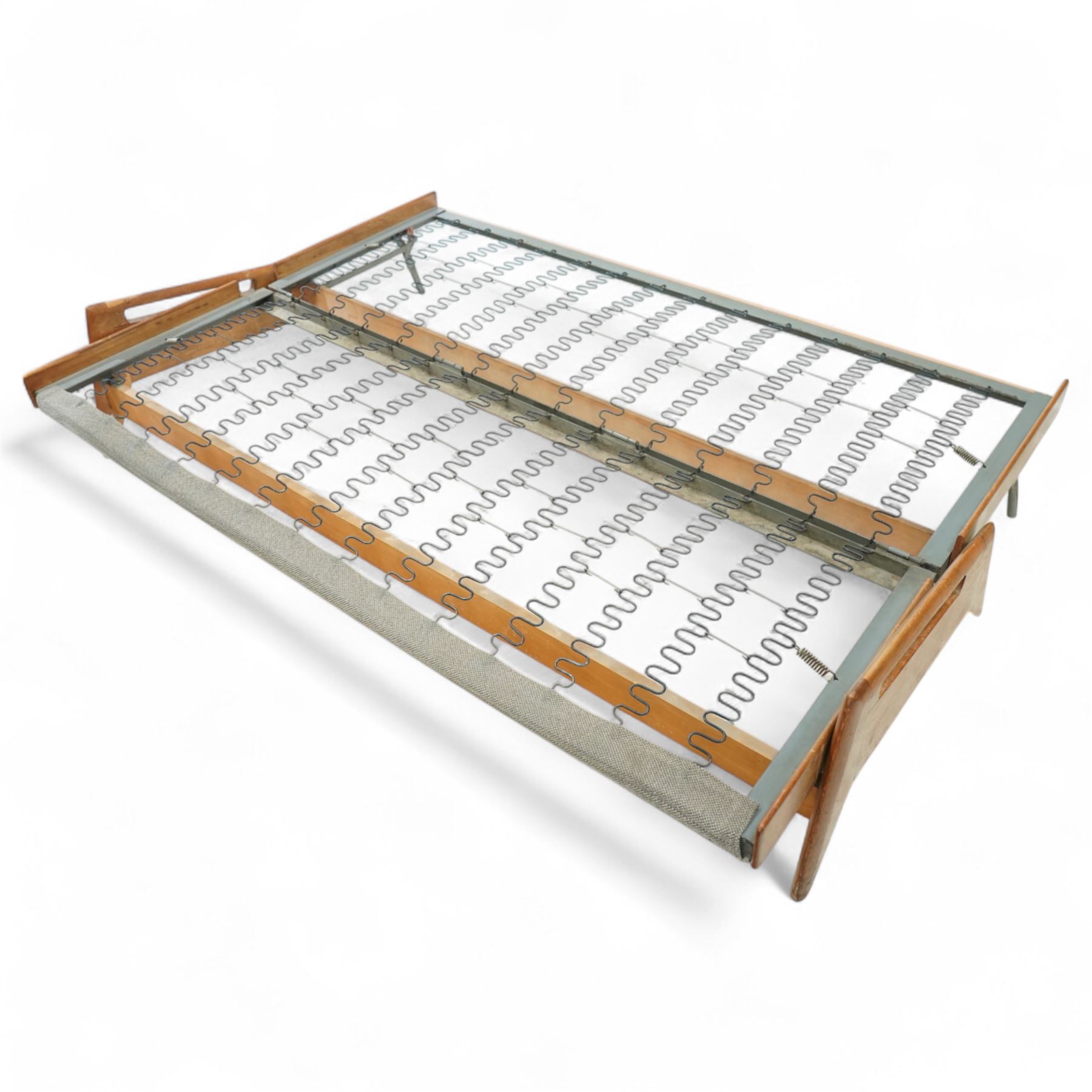 Gerard Guermonprez for Bobois - mid-century light teak sofa daybed, sides with angular teak wire sprung frame, integrated armrests with cut-out hand-holds, single fabric cushion back and seat, on out-swept tapered legs, circa 1955