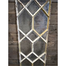 Four 19th century cast iron windows, lattice glazed in white painted finish, 
