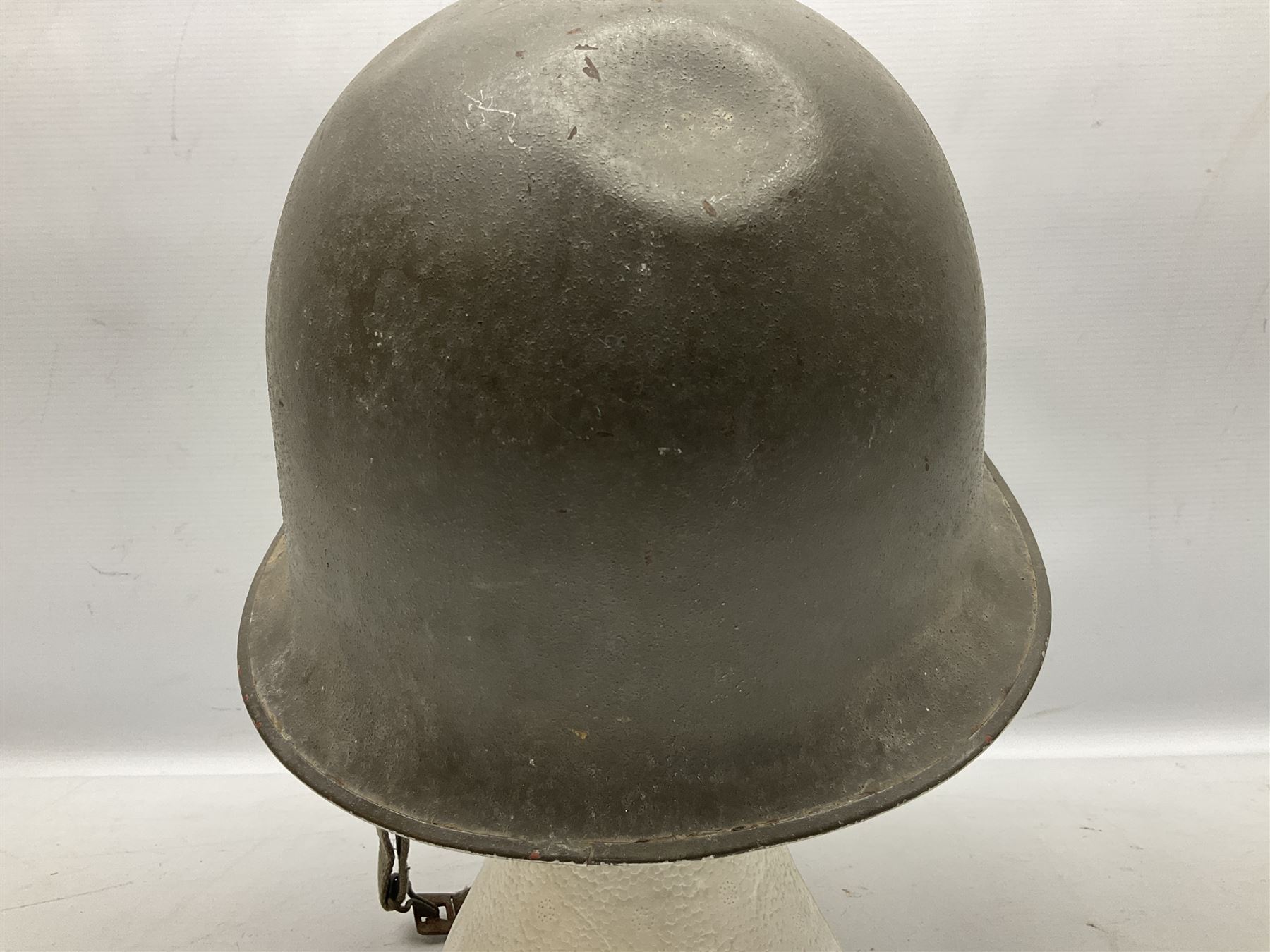 French Algerian War Red Cross steel helmet, marked 'CP ICA Esperaza 1955'; green finish with crudely painted Red Cross logo to the front
