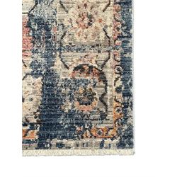 Contemporary Dunelm Soraya Persian design rug, blue and beige ground with faded floral and vine motifs, central medallion and trailing foliate patterns, bordered by a distressed design with stylised floral motifs