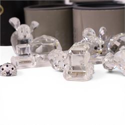 Collection of Swarovski crystal ornaments including train set, paperweight, towered building and many animal figurines, mostly in original boxes