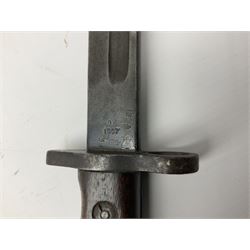 British Enfield 1907 model SMLE bayonet, with 43cm fullered steel blade and metal mounted leather scabbard L58cm overall; and Schmidt-Rubin Model 1918 bayonet the 30cm steel blade marked Elsener Schwyz No.579722; in steel scabbard with leather frog marked G. Bertolini Sellaio Vira/G.Tic 79 L45cm overall (2)