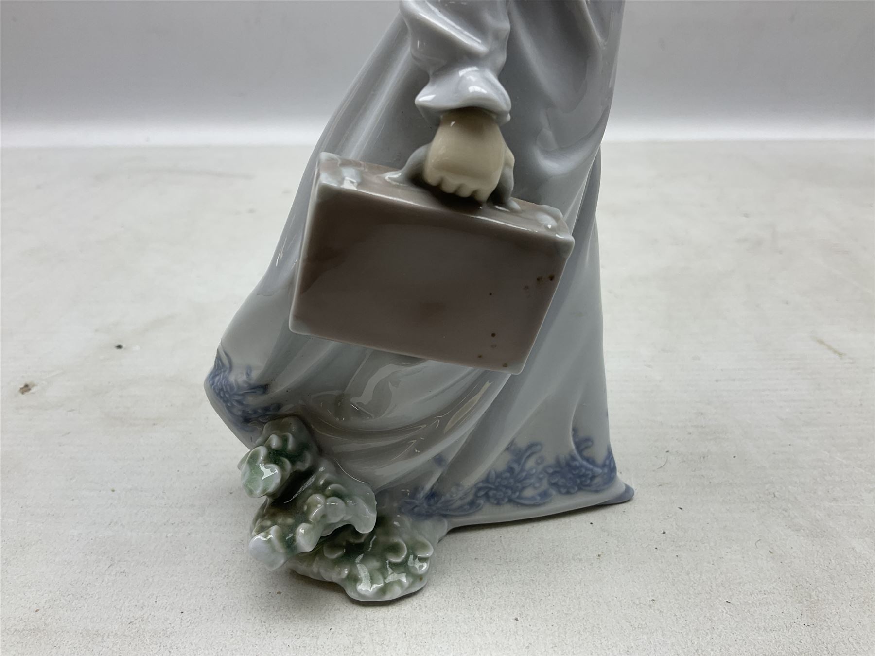 Three Lladro figures comprising, Pocket Full of Wishes no 7650, School Days no 7604 and Spring Bouquets no 7603, all with original boxes, largest example H26cm  