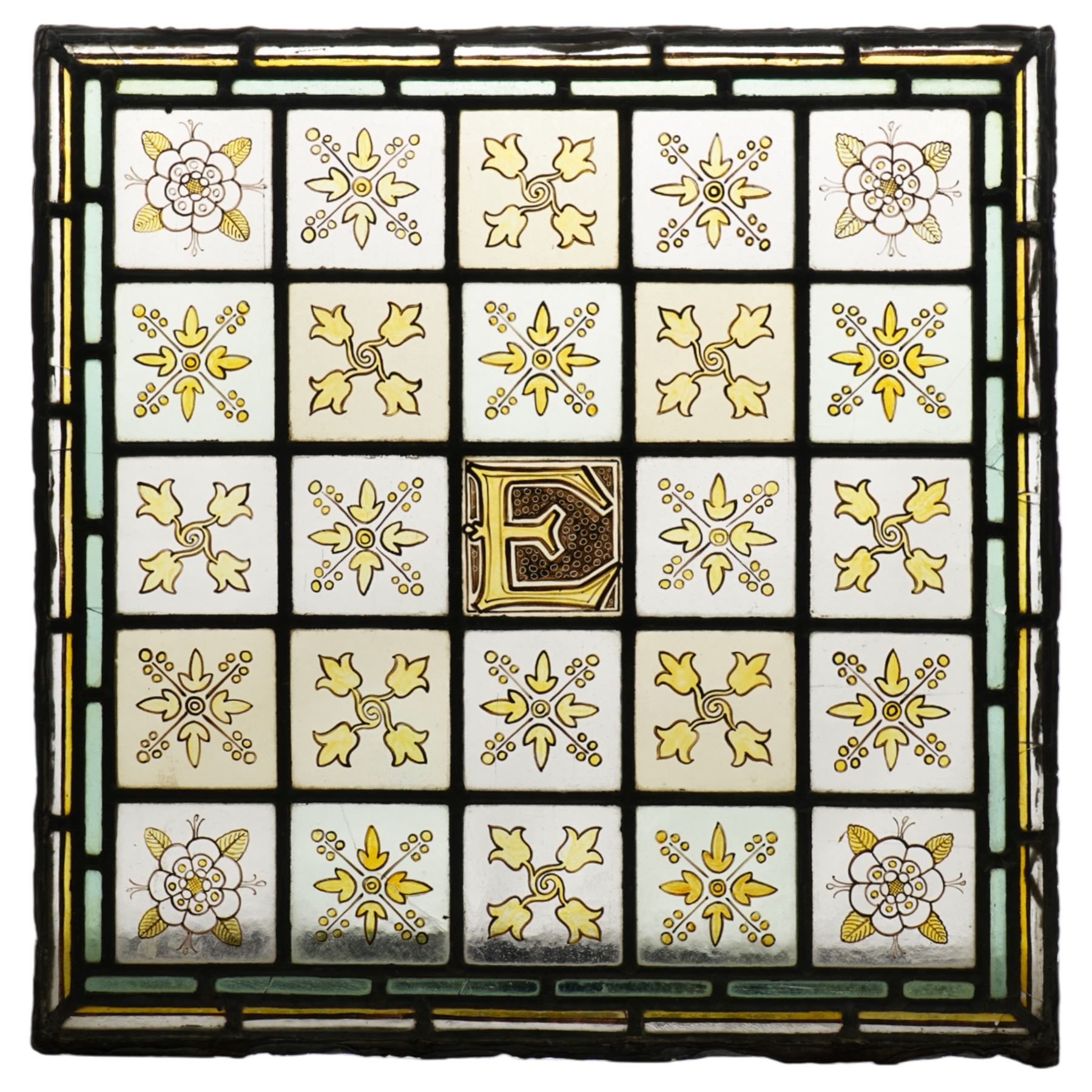 Edwardian stained glass panel, with central painted E motif surrounded by flowers and Yorkshire roses, H47cm