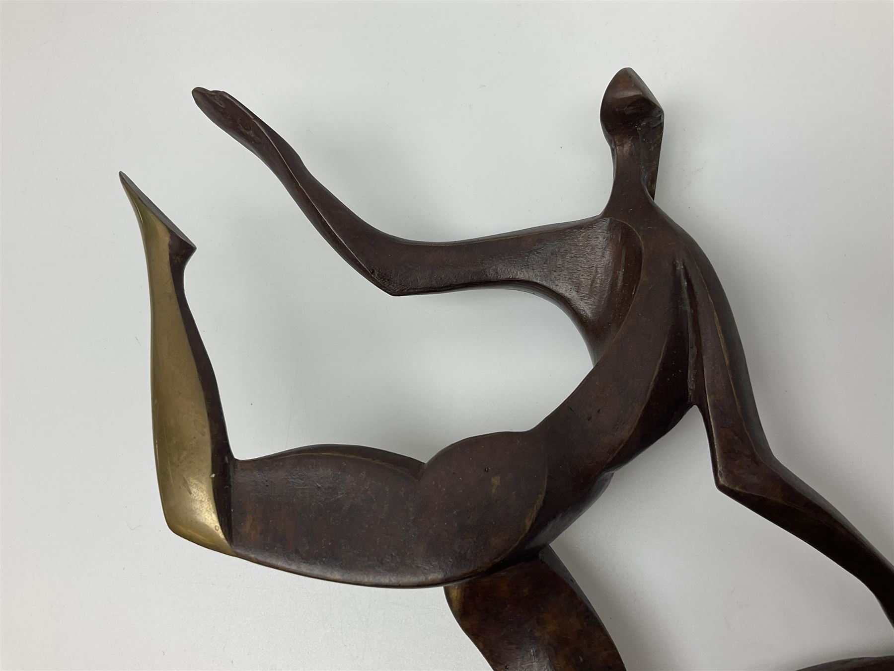 John Huggins FRBS (British 1938): 'Girl with Hoop', bronze sculpture upon black lacquered wooden base, H33cm, artist resale rights apply