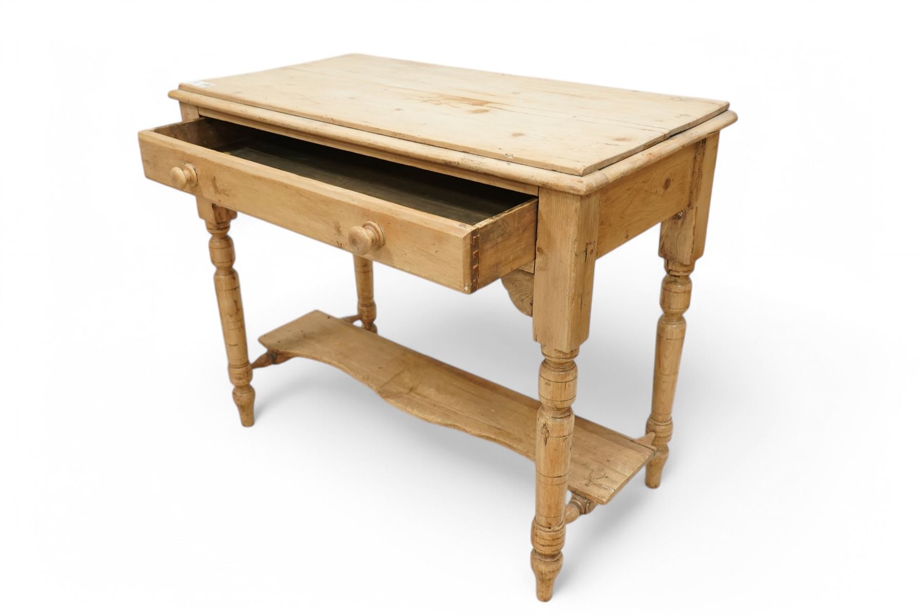 Victorian stripped pine narrow wash stand, fitted with single drawer, on turned supports (W50cm, H88cm, D52cm); together with a Victorian pine wash stand or side table (W89cm, H75cm, D46cm)
