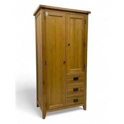 Light oak combination wardrobe, fitted with full-height compartment, single cupboard and three small drawers