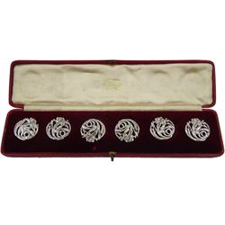 Set of six Art Nouveau silver buttons by Reynolds & Westwood, Birmingham 1901, in a fitted velvet and silk lined case