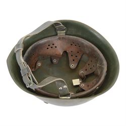 Italian G.N.R. (Guardia Nazionale Repubblicana) M33 helmet, circa 1943
The G.N.R were responsible for the internal security of the Italian State repubblic of Salo, after 1943 members of the security force consisted of ex carabinieri, fascist militaria men from the M.V.S.N and those who served in the P.A.I Italian African Police. 
