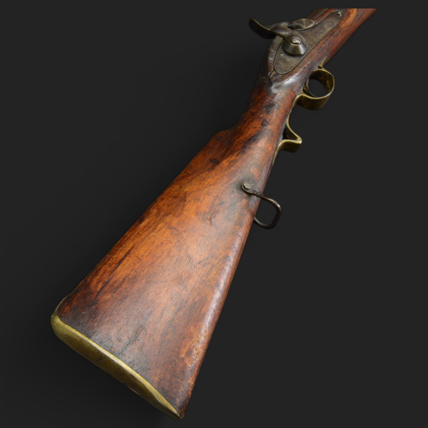 Percussion musket, the 70cm barrel with ramrod under, full walnut stock, with two sling swivels, overall L110cm
Sold as an exempt item under Section 58 (2) of the 1968 Firearms Act, to be held as a curiosity or ornament