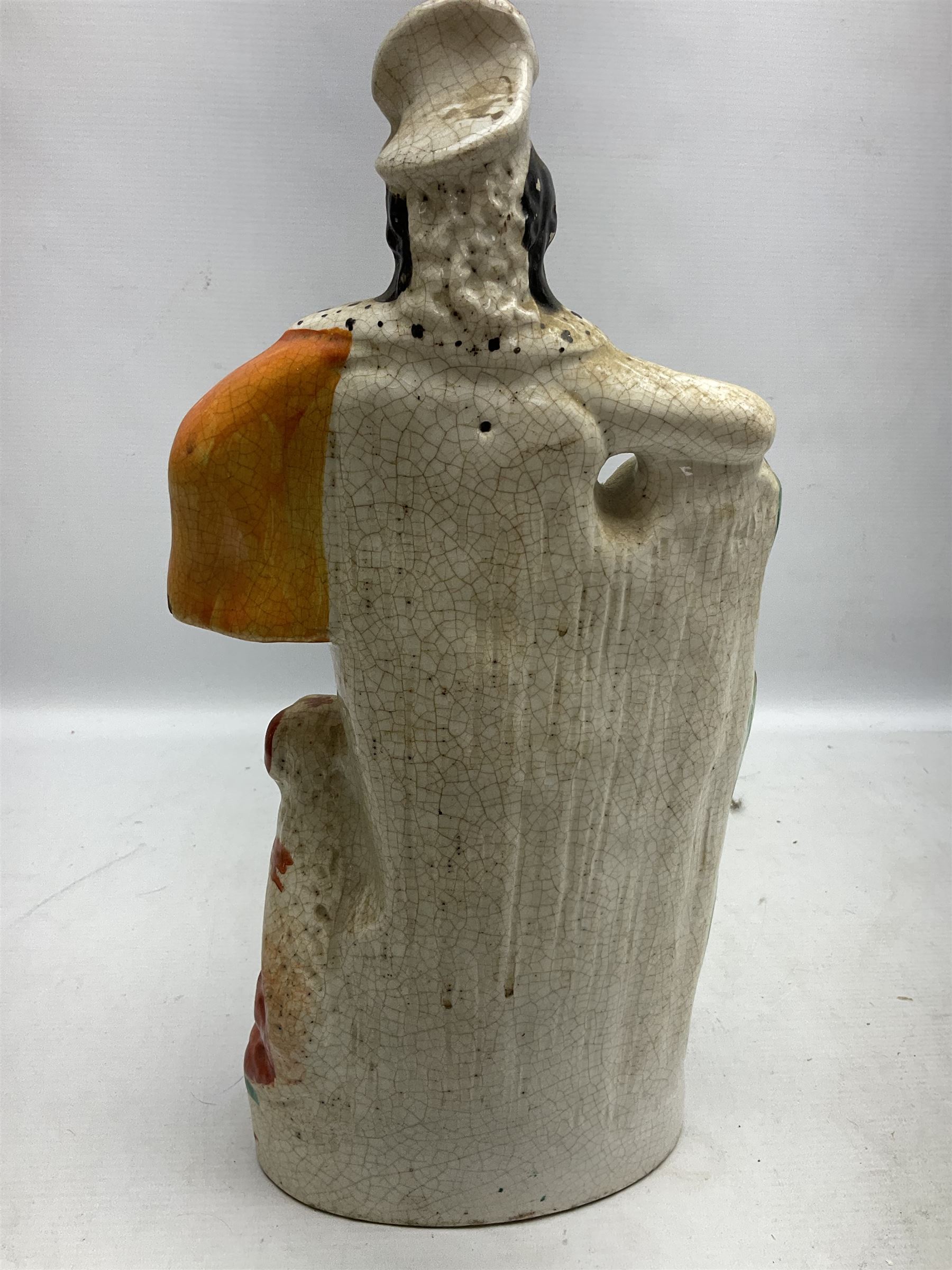 Group of Victorian and later Staffordshire style figures, to include two dogs, Prince upon horse back, horse with pink lustre patches, tall figure of a man beside his dog etc, tallest H41cm