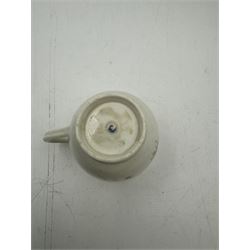 18th century Caughley blue and white sparrow jug, decorated in the Mother and Child pattern, circa 1780-1790, with underglaze C mark beneath, H9cm, together with a Worcester coffee cup, circa 1785 painted with floral sprays in underglaze blue and gilt, with crescent mark beneath, and a Caughley trio of tea cup, tea bowl and saucer, each of moulded wrythen fluted form and decorated with gilt and blue sprigs and bands, each with crescent mark beneath, (5)