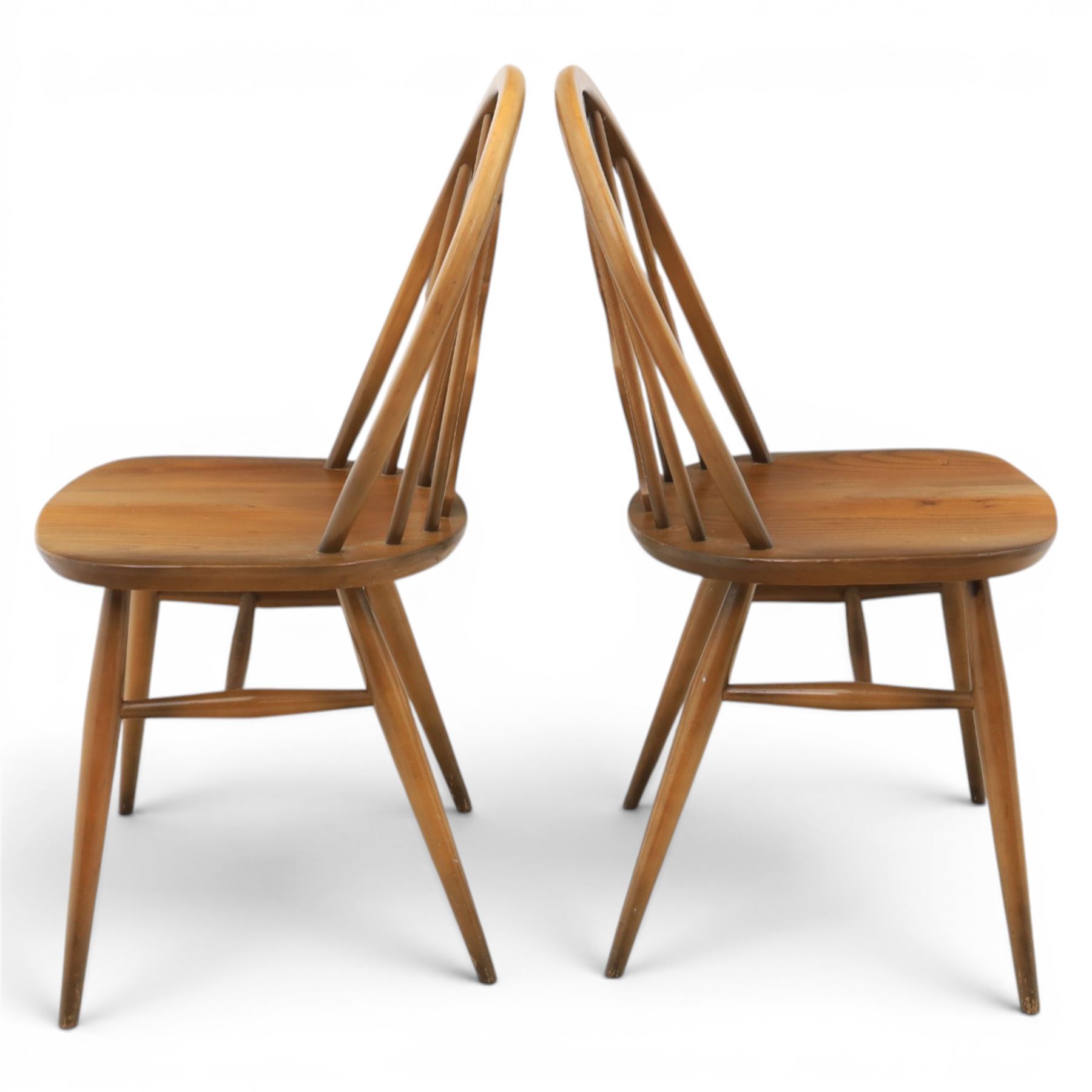 Ercol - Set of four dark elm 'Fleur De Lys' chairs